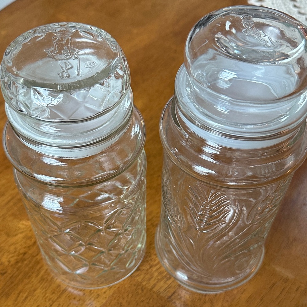 Set of Two Clear Glass Mr. Peanut Jars with Patterns